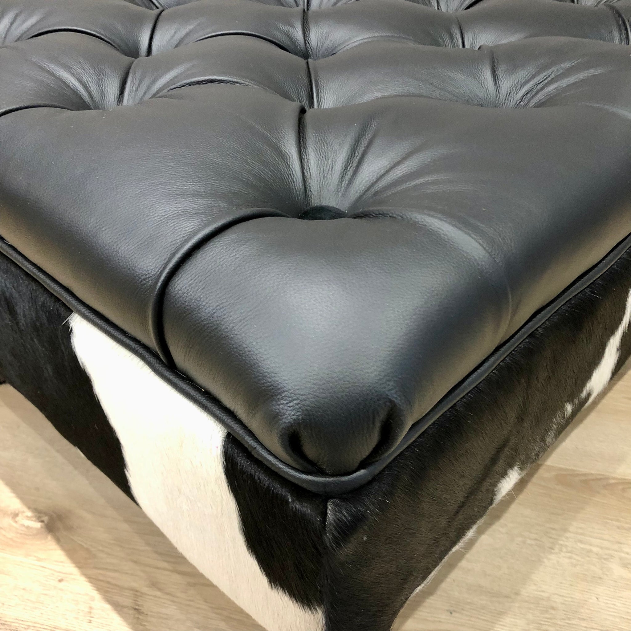 Gray cowhide ottoman deals